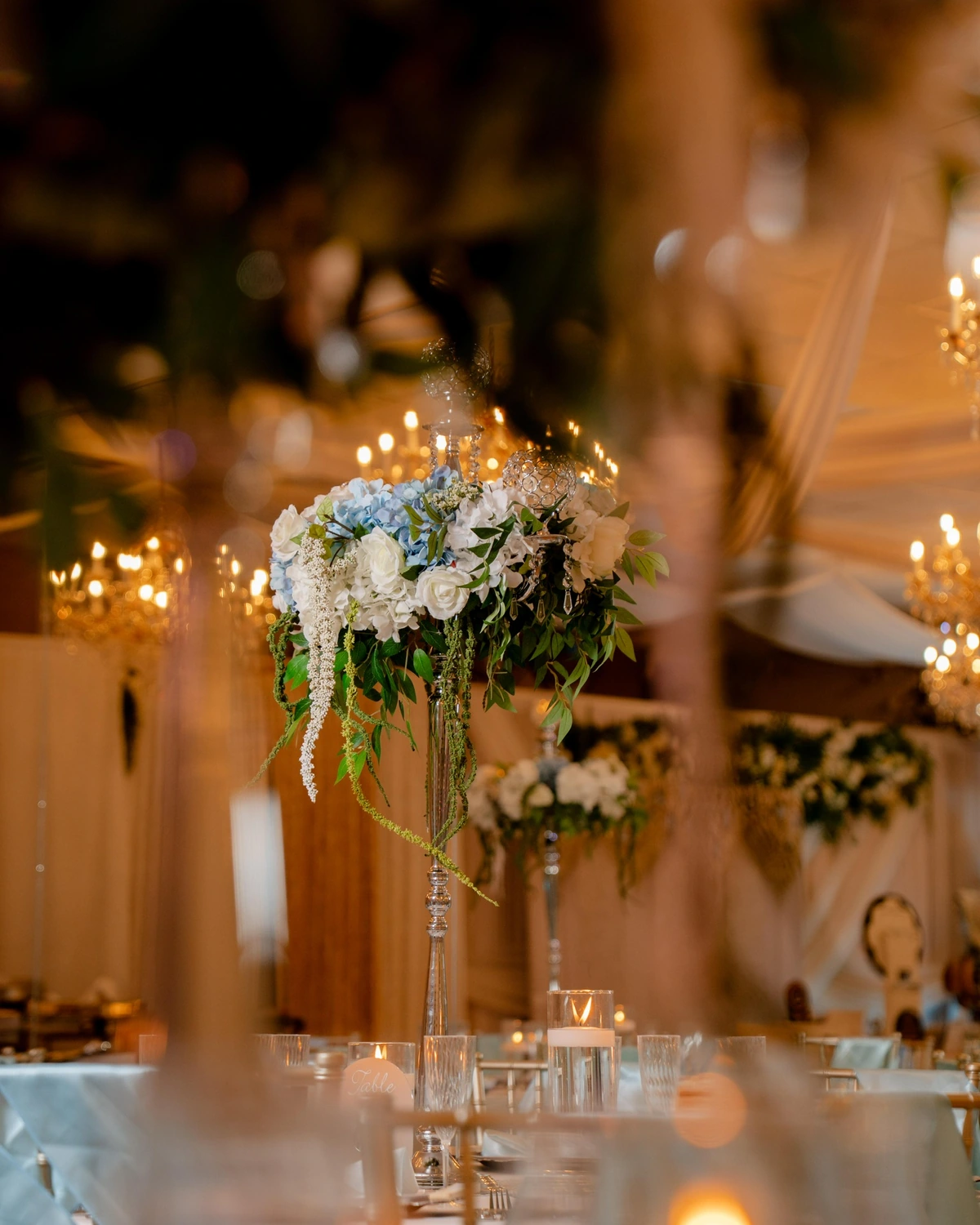 Candlelit flowers and reception details