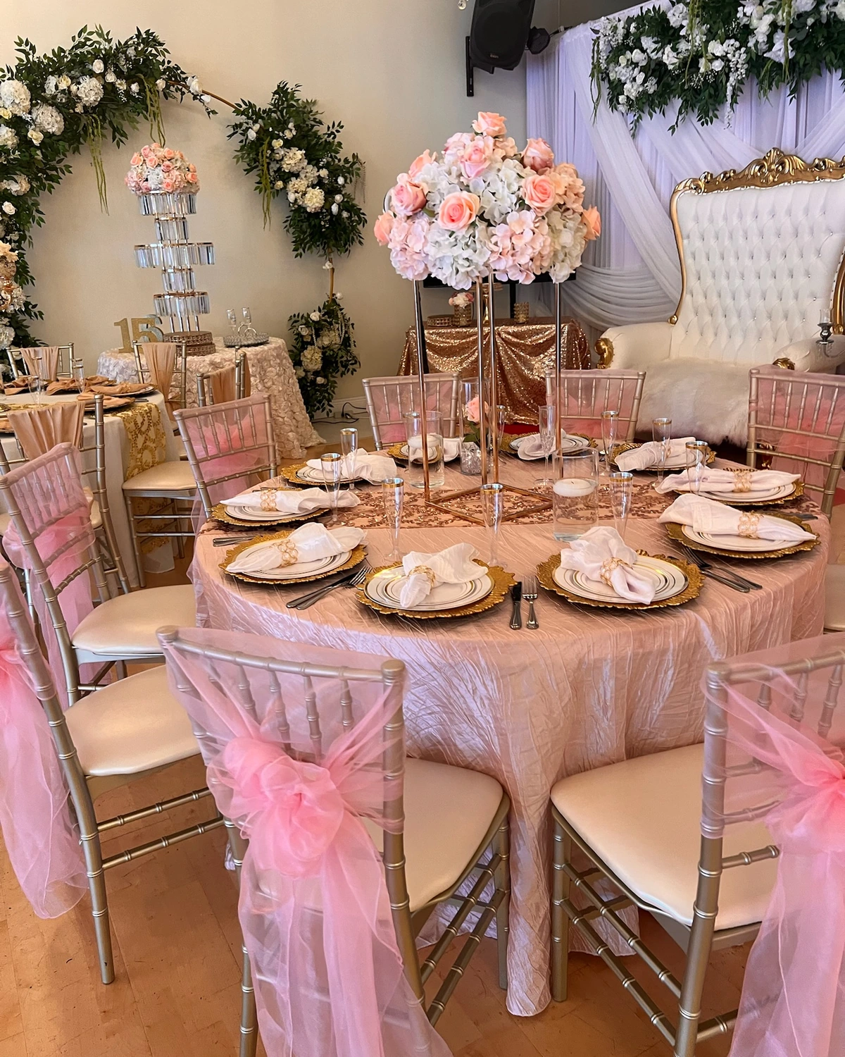 Pink and gold table styling for a personal celebration